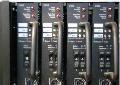Multi-channel card rack with vehicle loop detectors